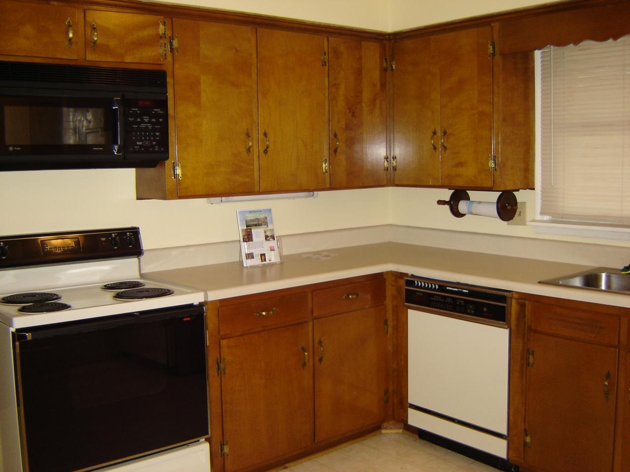 3051 Webster Road Blue Ridge, VA 24064 - Photo 4 of 39 a kitchen with a sink a stove and cabinets