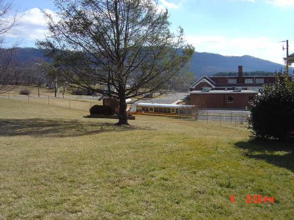 3051 Webster Road Blue Ridge, VA 24064 - Photo 34 of 39 a view of a house with a yard