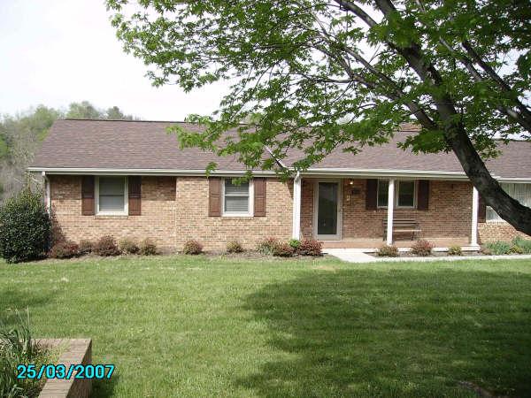3051 Webster Road Blue Ridge, VA 24064 - Photo 39 of 39 a front view of a house with a yard and porch