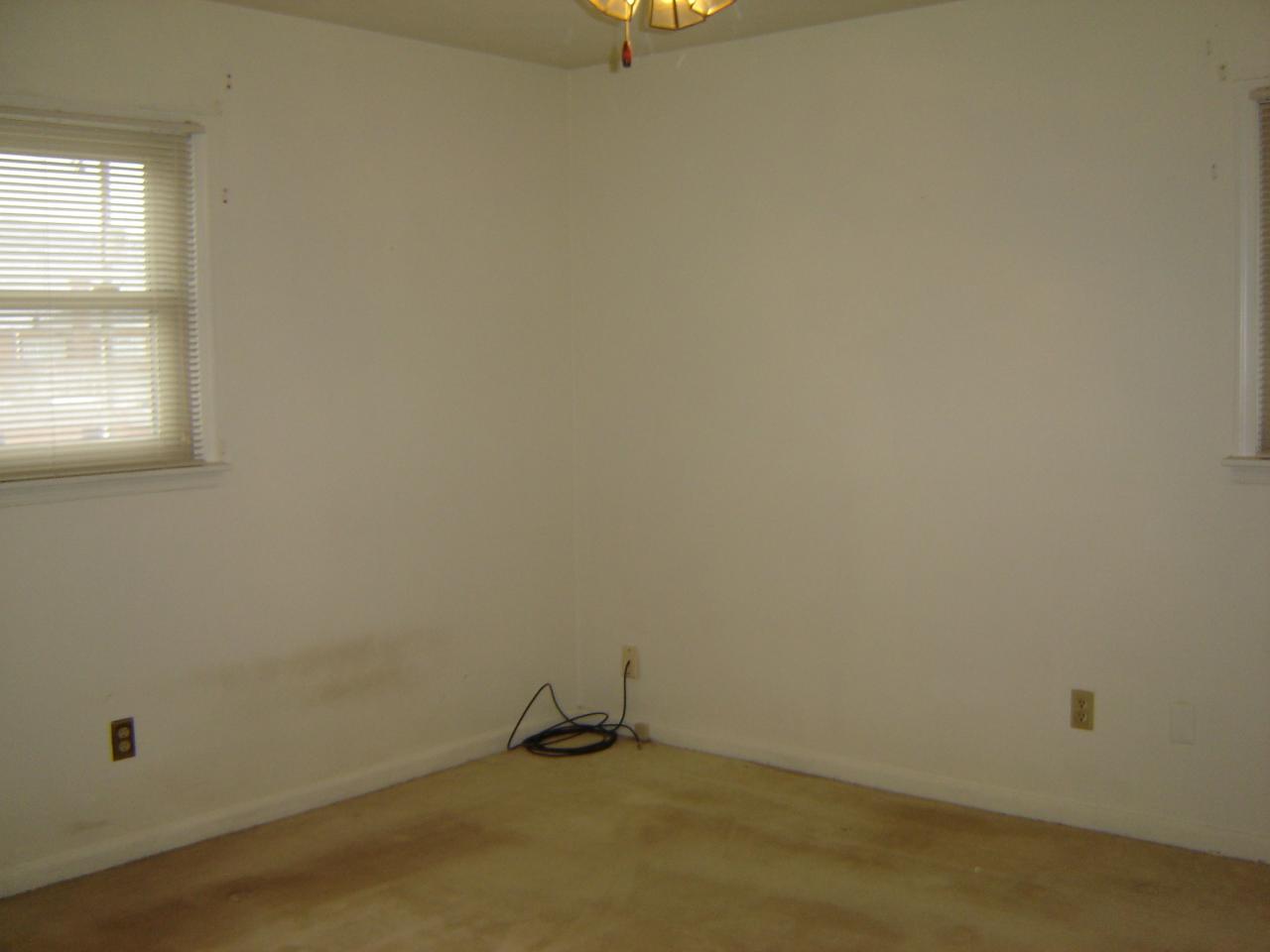 3051 Webster Road Blue Ridge, VA 24064 - Photo 6 of 39 an empty room with a window