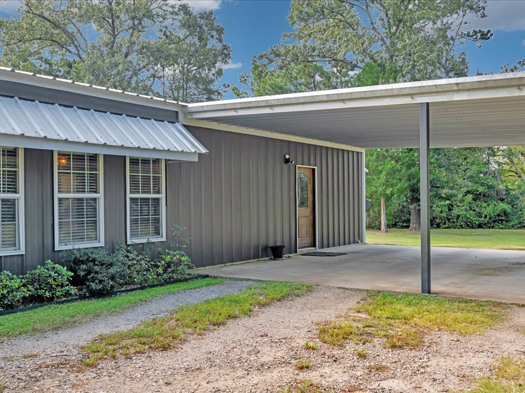 3335 Bethlehem Road Lufkin, TX 75904 - Photo 13 of 50 a backyard of a house with plants and outdoor seating