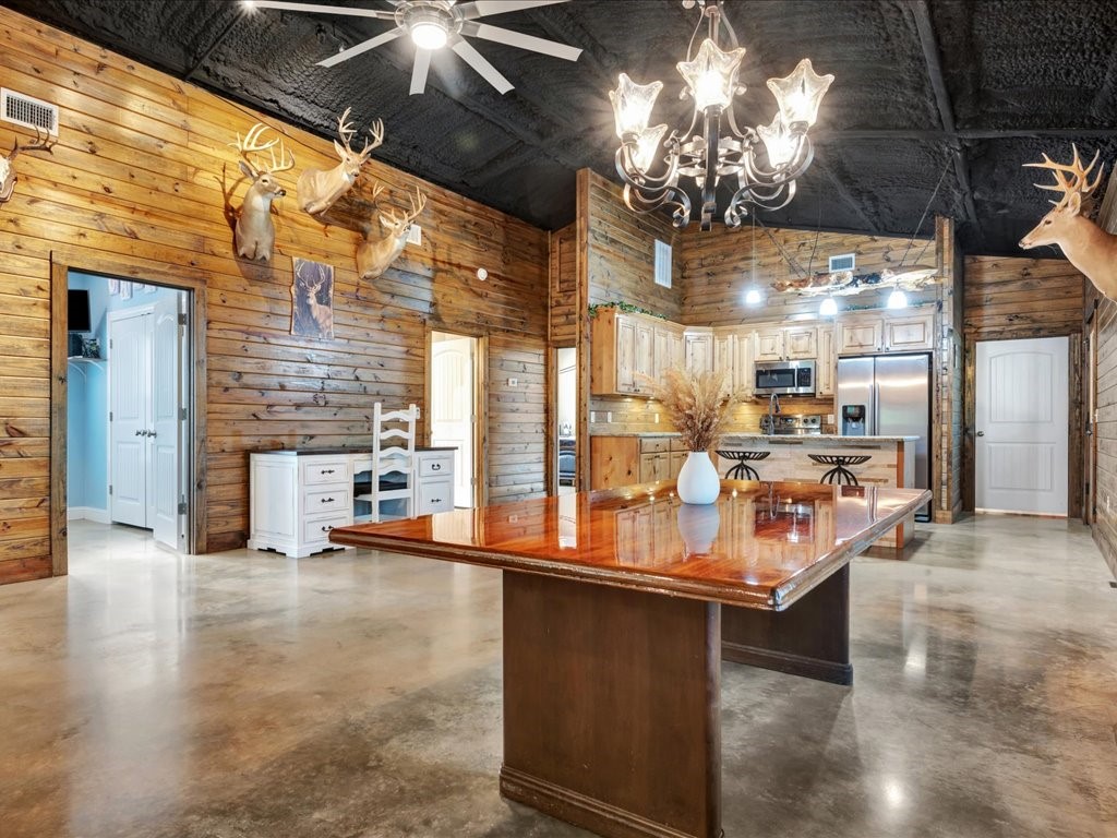 3335 Bethlehem Road Lufkin, TX 75904 - Photo 17 of 50 a room with lots of counter space and chandelier