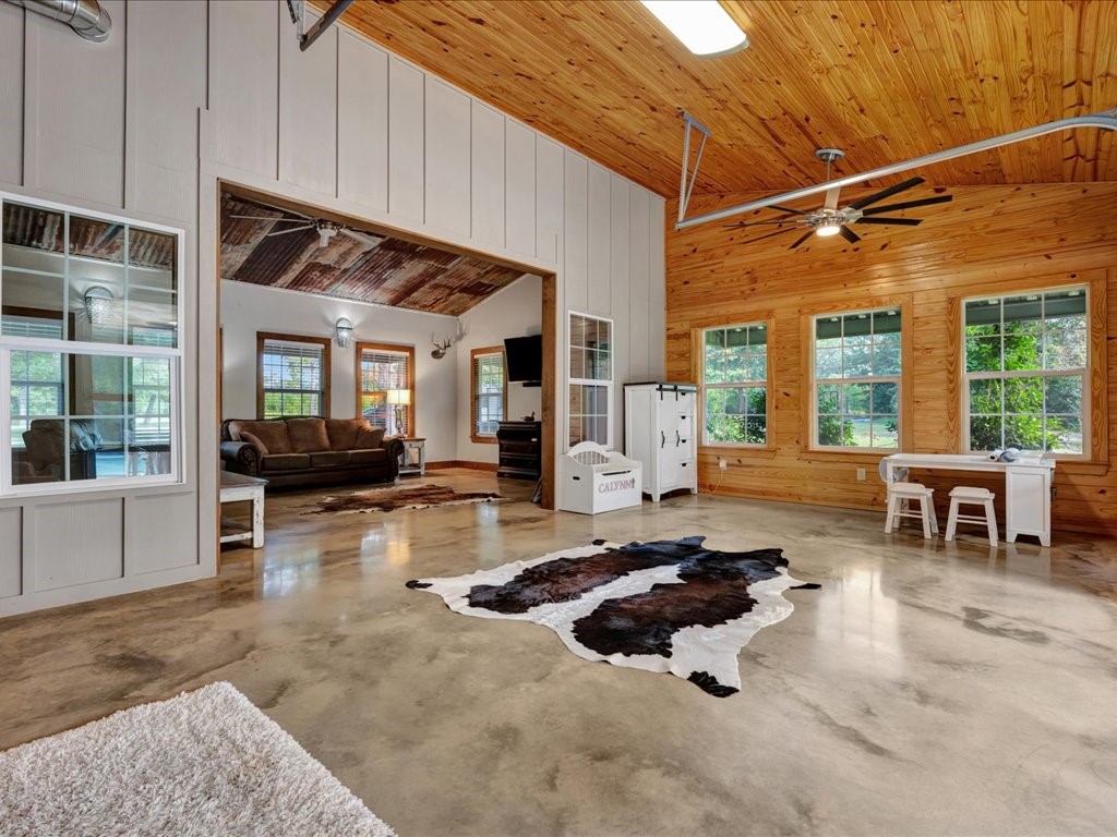 3335 Bethlehem Road Lufkin, TX 75904 - Photo 26 of 50 a living room with furniture large window and flat screen tv