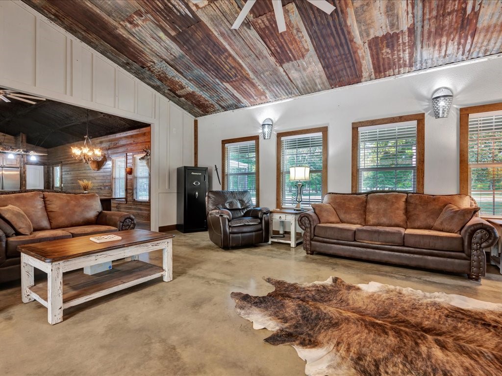 3335 Bethlehem Road Lufkin, TX 75904 - Photo 29 of 50 a living room with furniture and a chandelier
