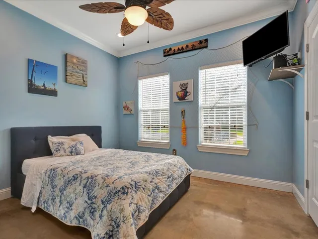 a view of a patio with a table and chairs