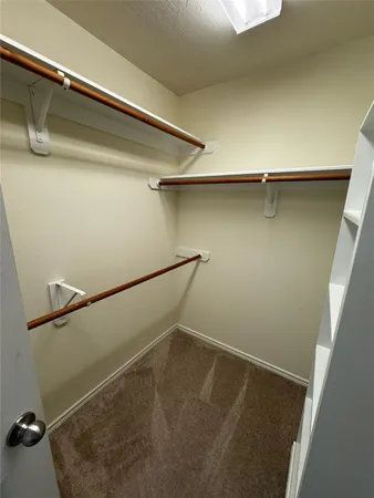 a view of a room with racks on the wall