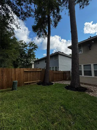 a view of backyard with green space