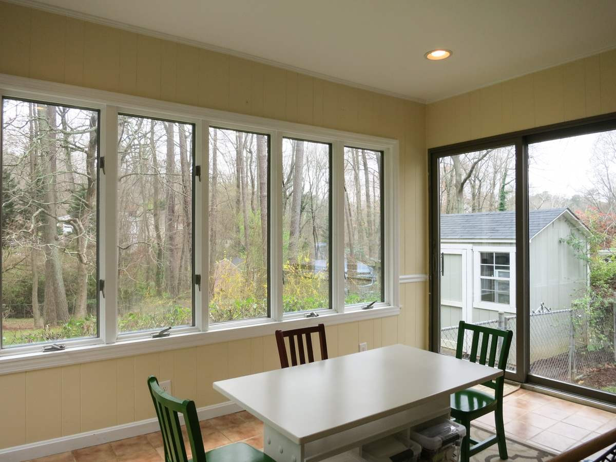 912 Hardimont Road Raleigh, NC 27609 - Photo 11 of 25 The Sun Rm has a tile flr, recessed lights, book shelves & 2 sets of sliders to the back & side yards. Sun Room
