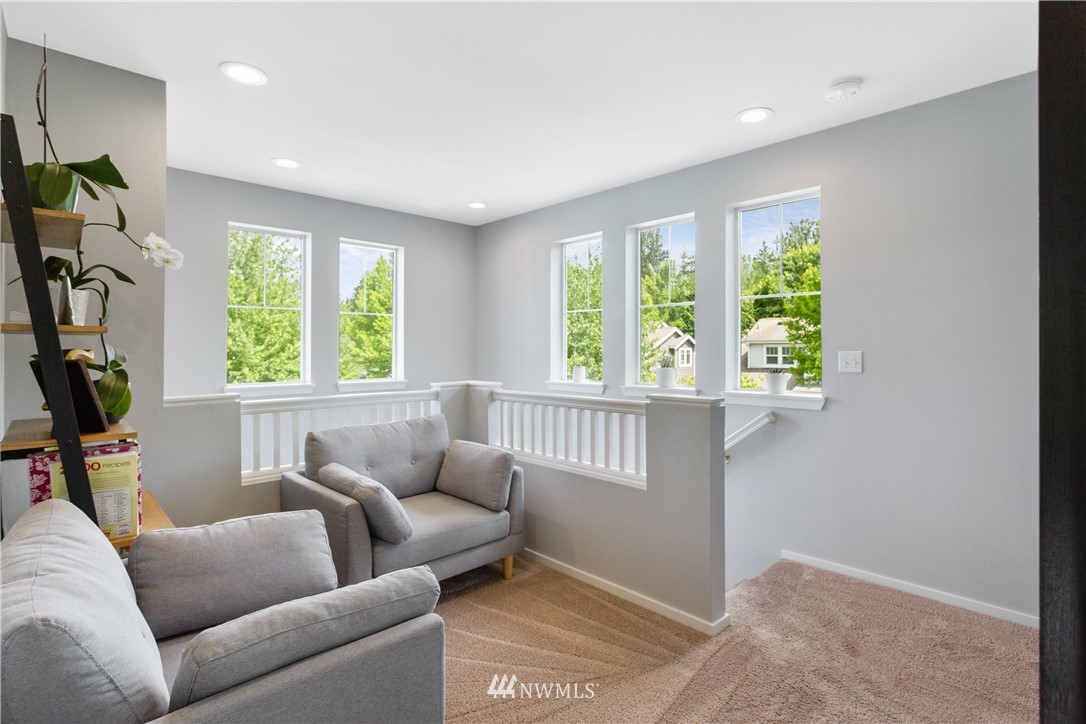 529 Chelan Place Northeast Renton, WA 98059 - Photo 12 of 20 a living room with furniture and a window