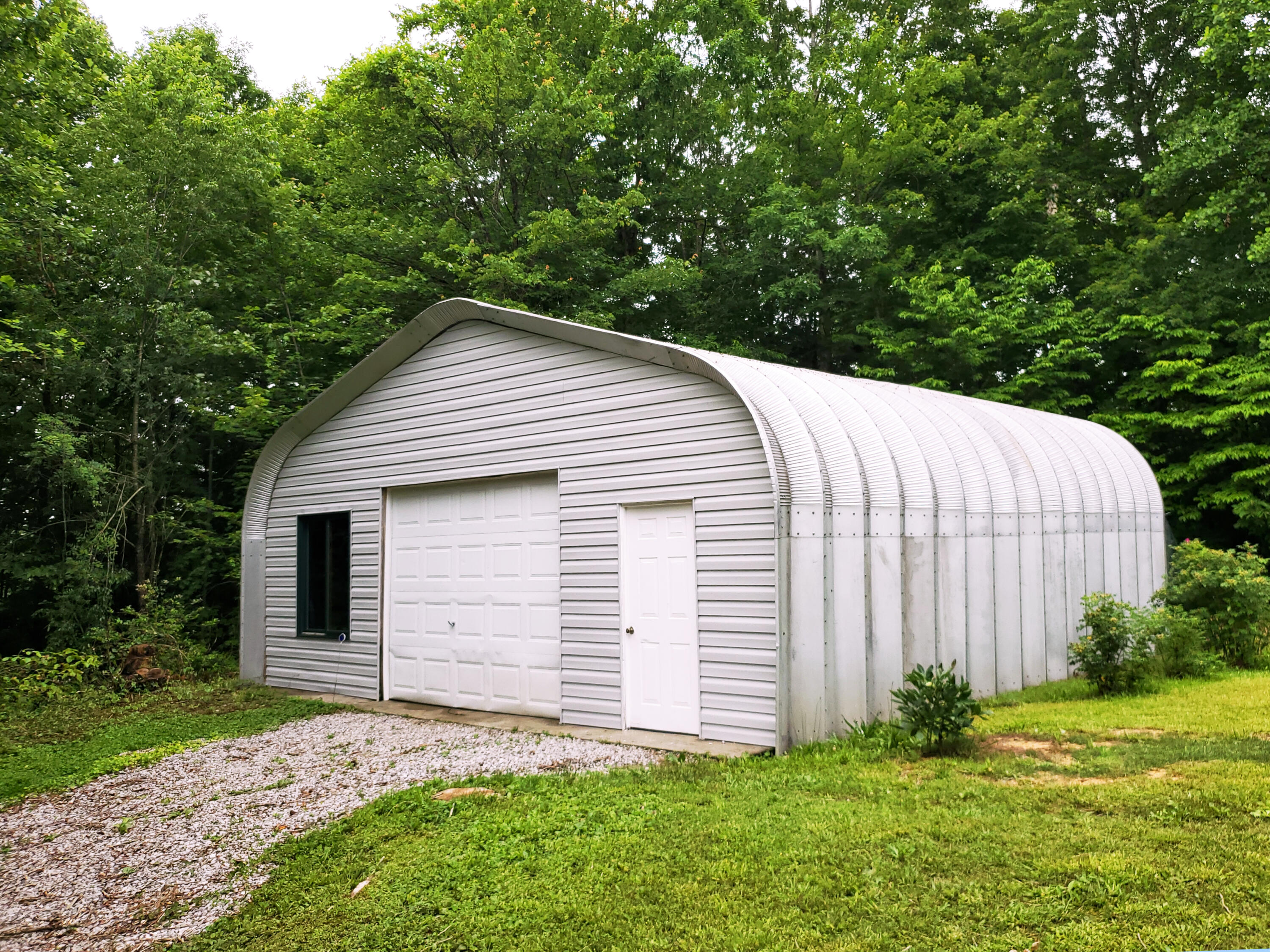 312 Bill Neal Road Whitley City, KY 42653 - Photo 6 of 57 01 Outside 06 Garage 1