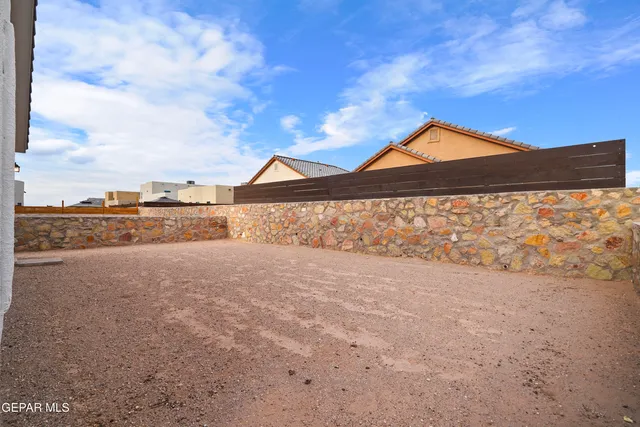 a view of large lake with a big yard