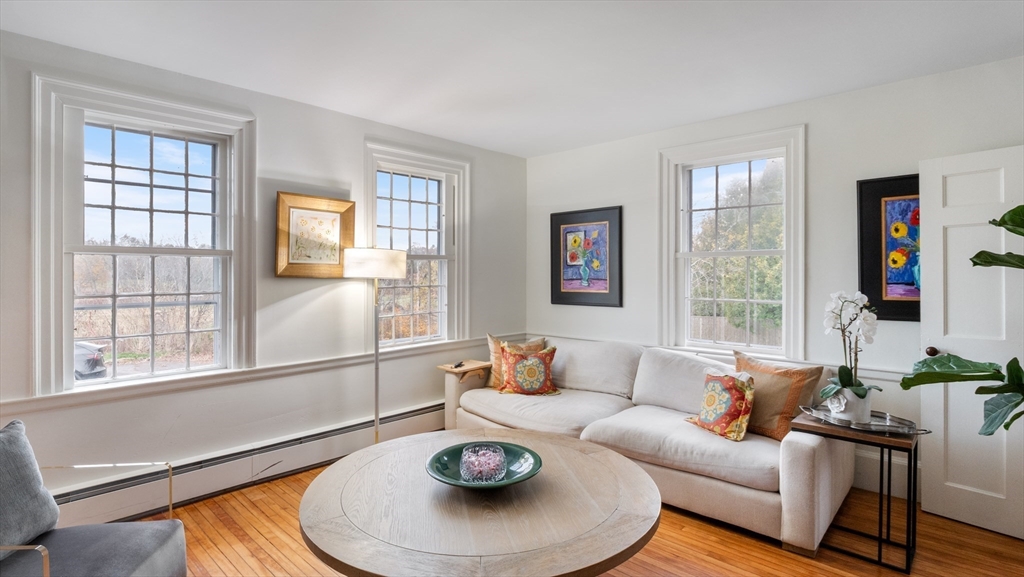 239 High Road Newbury, MA 01951 - Photo 11 of 42 a living room with furniture and a wooden floor