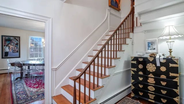 a view of entryway with wooden floor