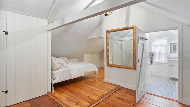 a view of a bedroom from the hallway