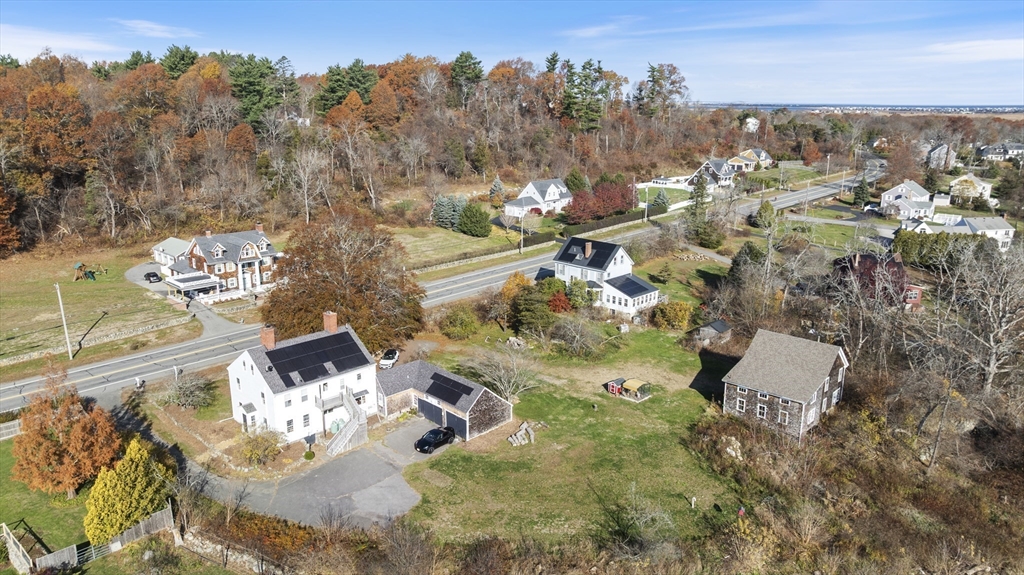 239 High Road Newbury, MA 01951 - Photo 39 of 42 an aerial view of a house with a yard