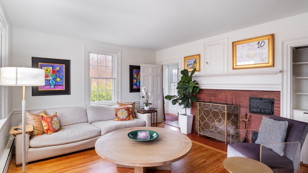 239 High Road Newbury, MA 01951 - Photo 10 of 42 a living room with furniture and a fireplace