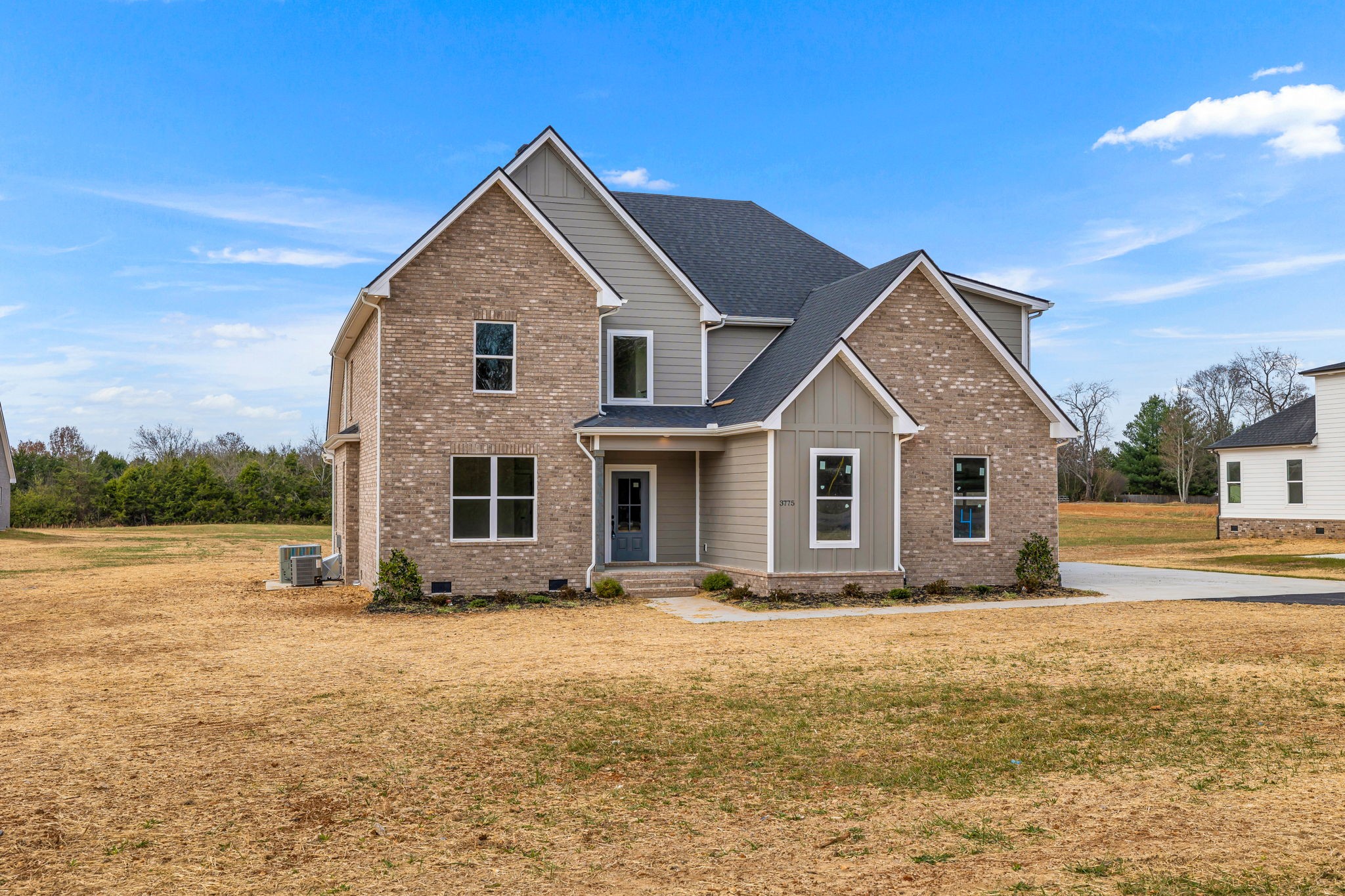3775 Highship Road Murfreesboro, TN 37130 - Photo 2 of 39 a front view of house with yard and trees in the background