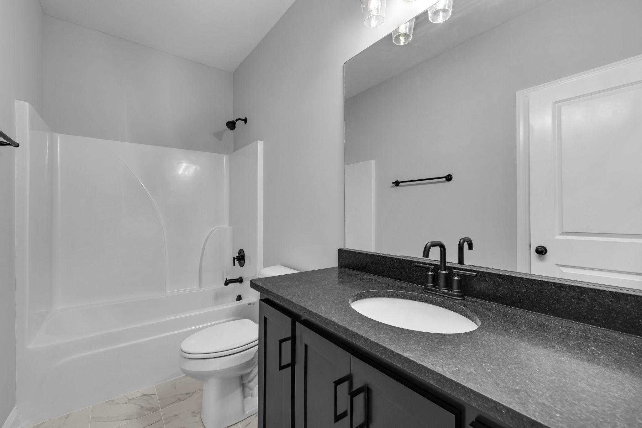 3775 Highship Road Murfreesboro, TN 37130 - Photo 26 of 39 a bathroom with a granite countertop sink toilet and shower