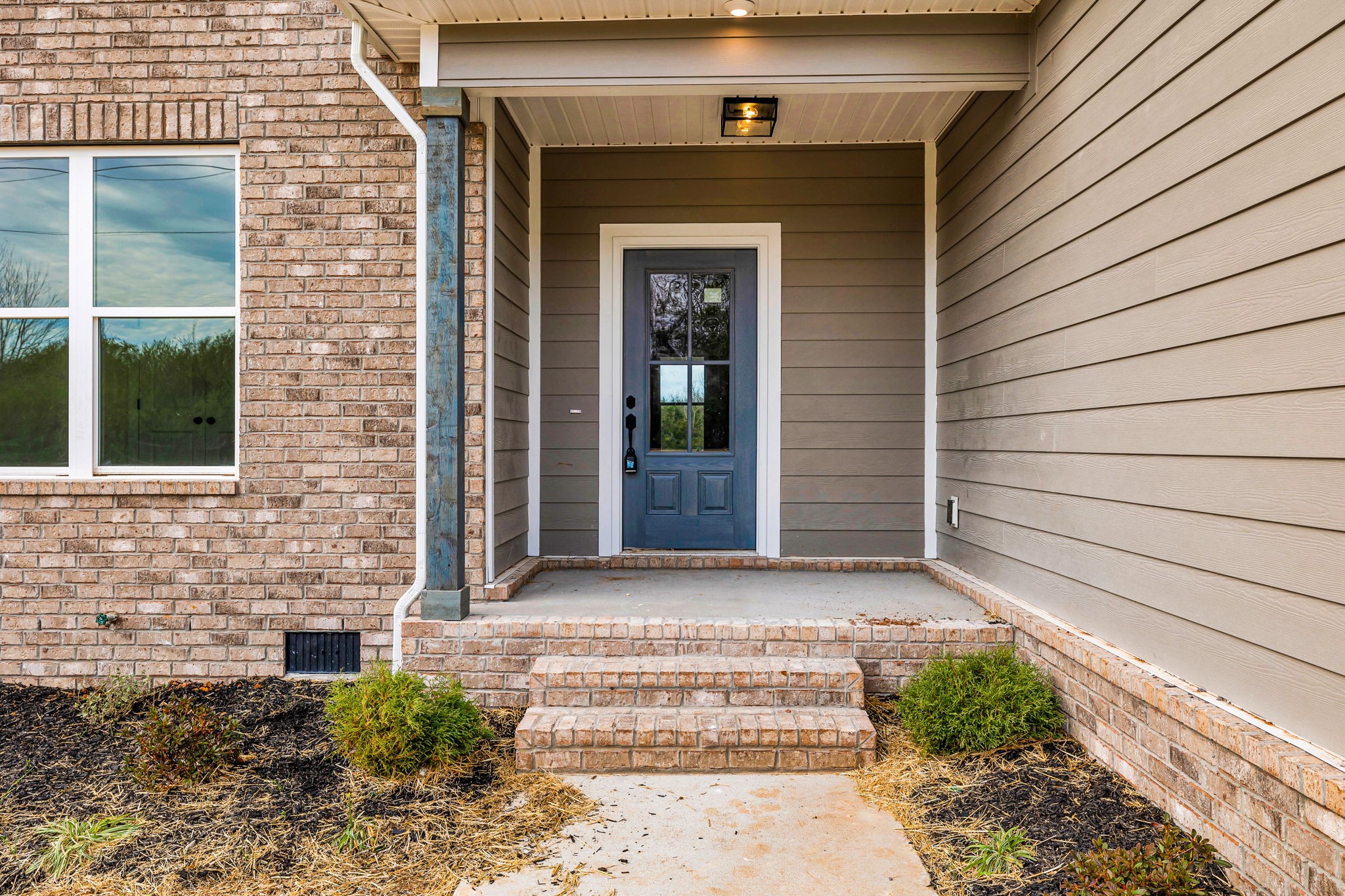 3775 Highship Road Murfreesboro, TN 37130 - Photo 4 of 39 a front view of a house with a yard
