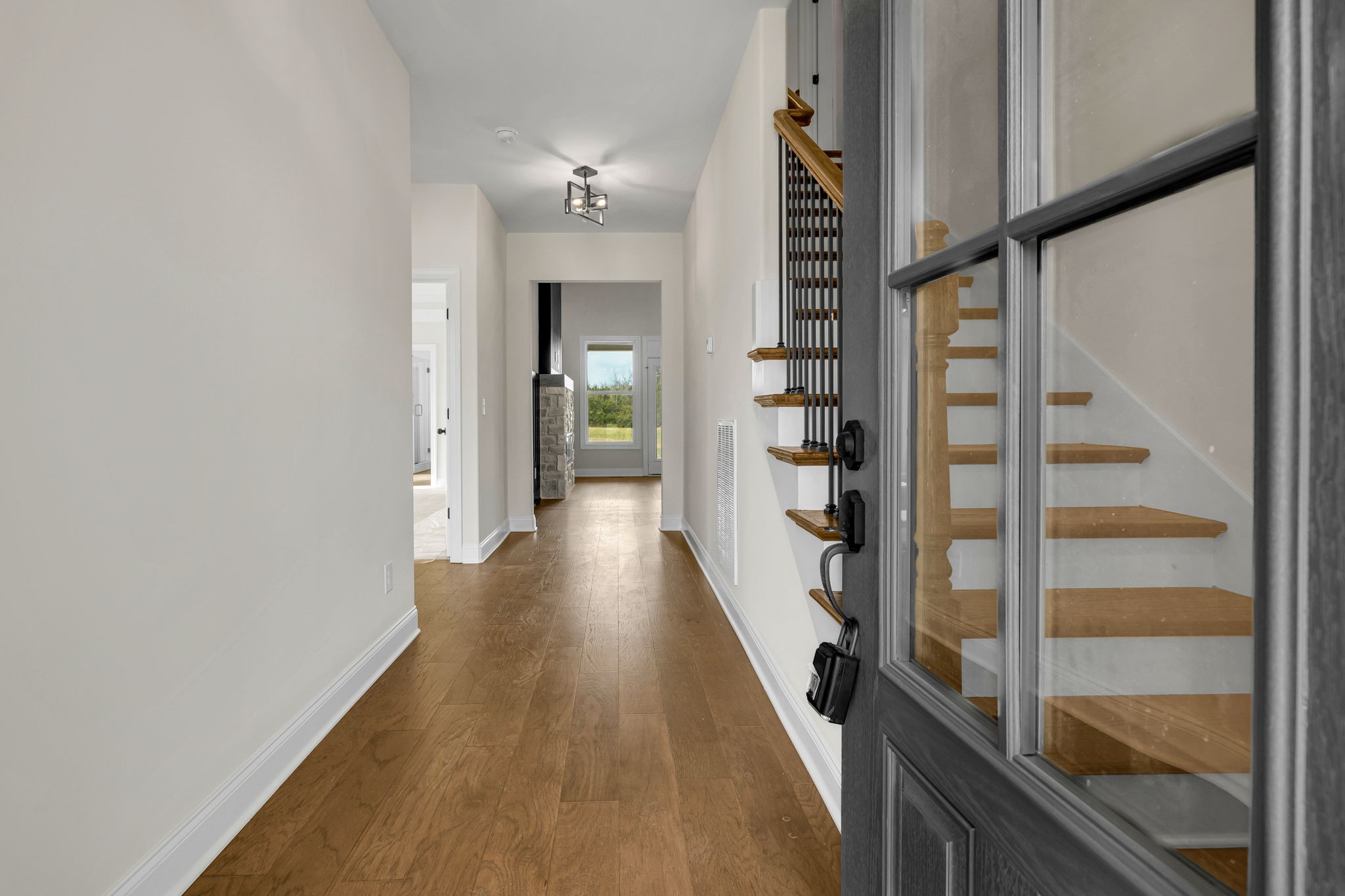 3775 Highship Road Murfreesboro, TN 37130 - Photo 5 of 39 a view of hallway with wooden floor and stairs