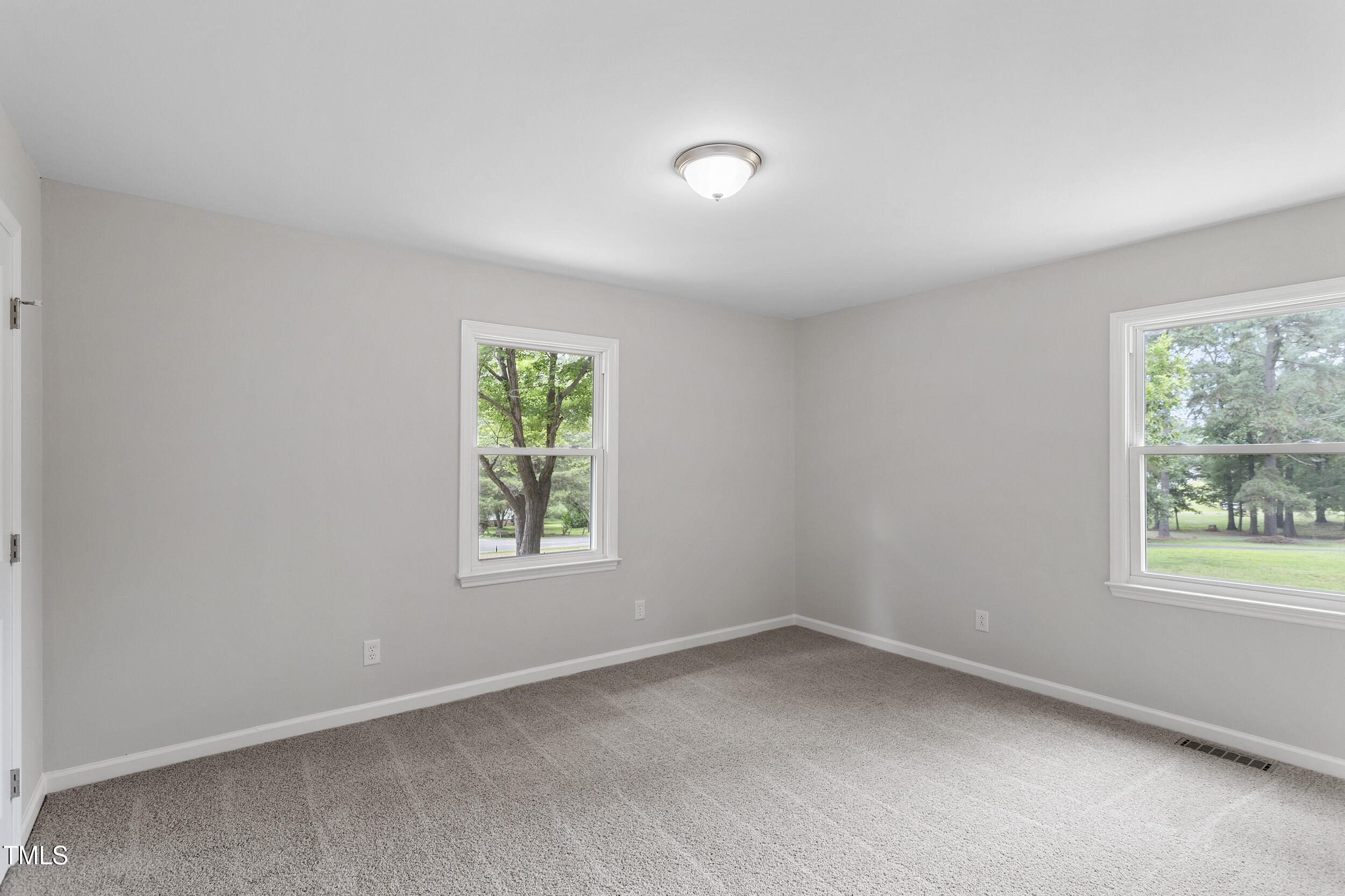 2702 Red Valley Drive Rougemont, NC 27572 - Photo 20 of 25 an empty room with windows