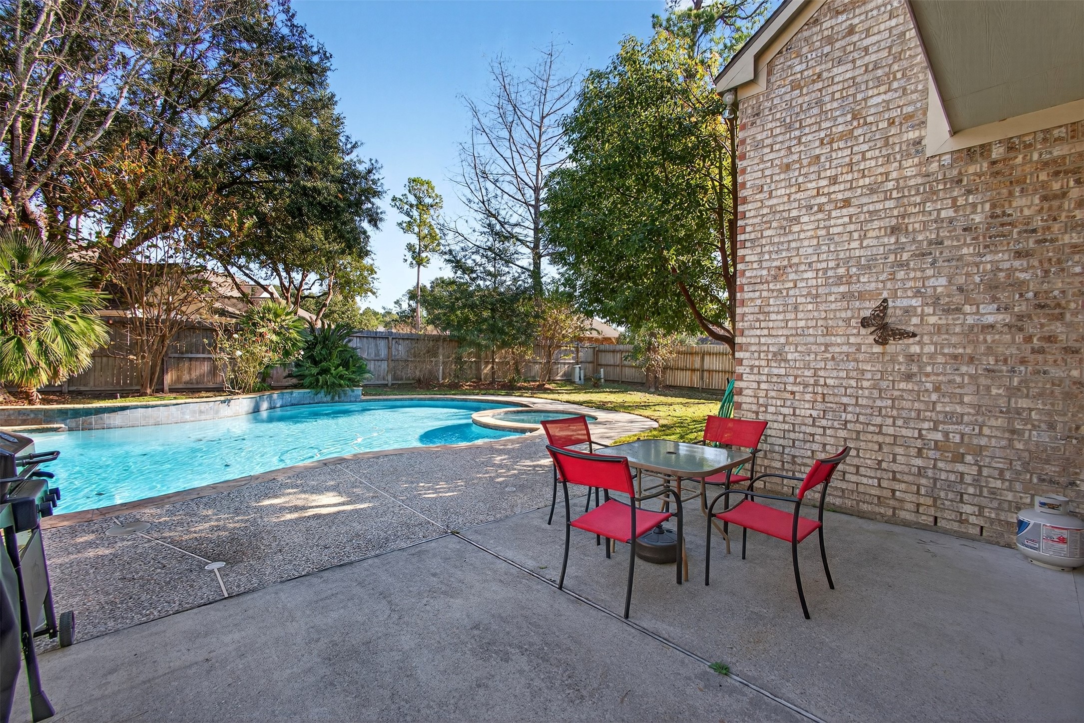 15614 Stable Brook Circle Cypress, TX 77429 - Photo 41 of 48 Huge pool and a nice patio, plenty space for a BBQ grill and some seating.