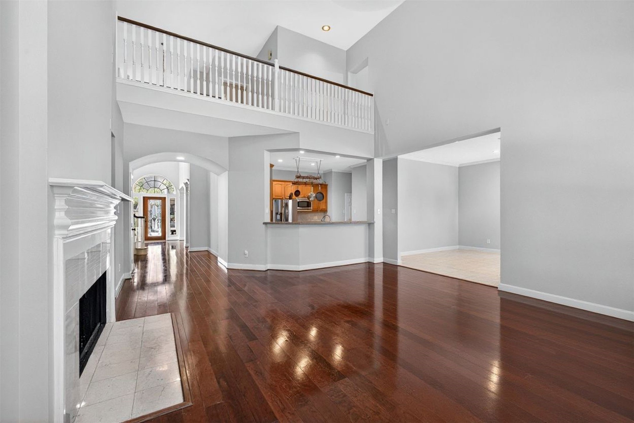 15614 Stable Brook Circle Cypress, TX 77429 - Photo 9 of 48 View from the living room: open concept, you see the foyer, kitchen and breakfast room from this vantage point.