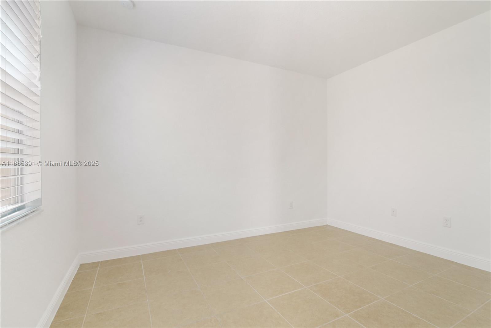 1108 Southwest 146th Terrace Pembroke Pines, FL 33027 - Photo 11 of 14 a view of an empty room