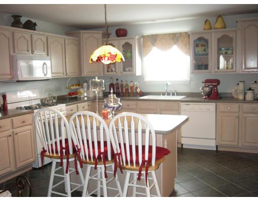 206 Manchester Street Fall River, MA 02721 - Photo 11 of 12 a view of a kitchen from a dining room
