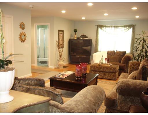 206 Manchester Street Fall River, MA 02721 - Photo 5 of 12 a living room with furniture and a large window