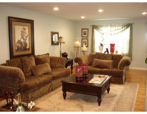 206 Manchester Street Fall River, MA 02721 - Photo 8 of 12 a living room with furniture and a large window