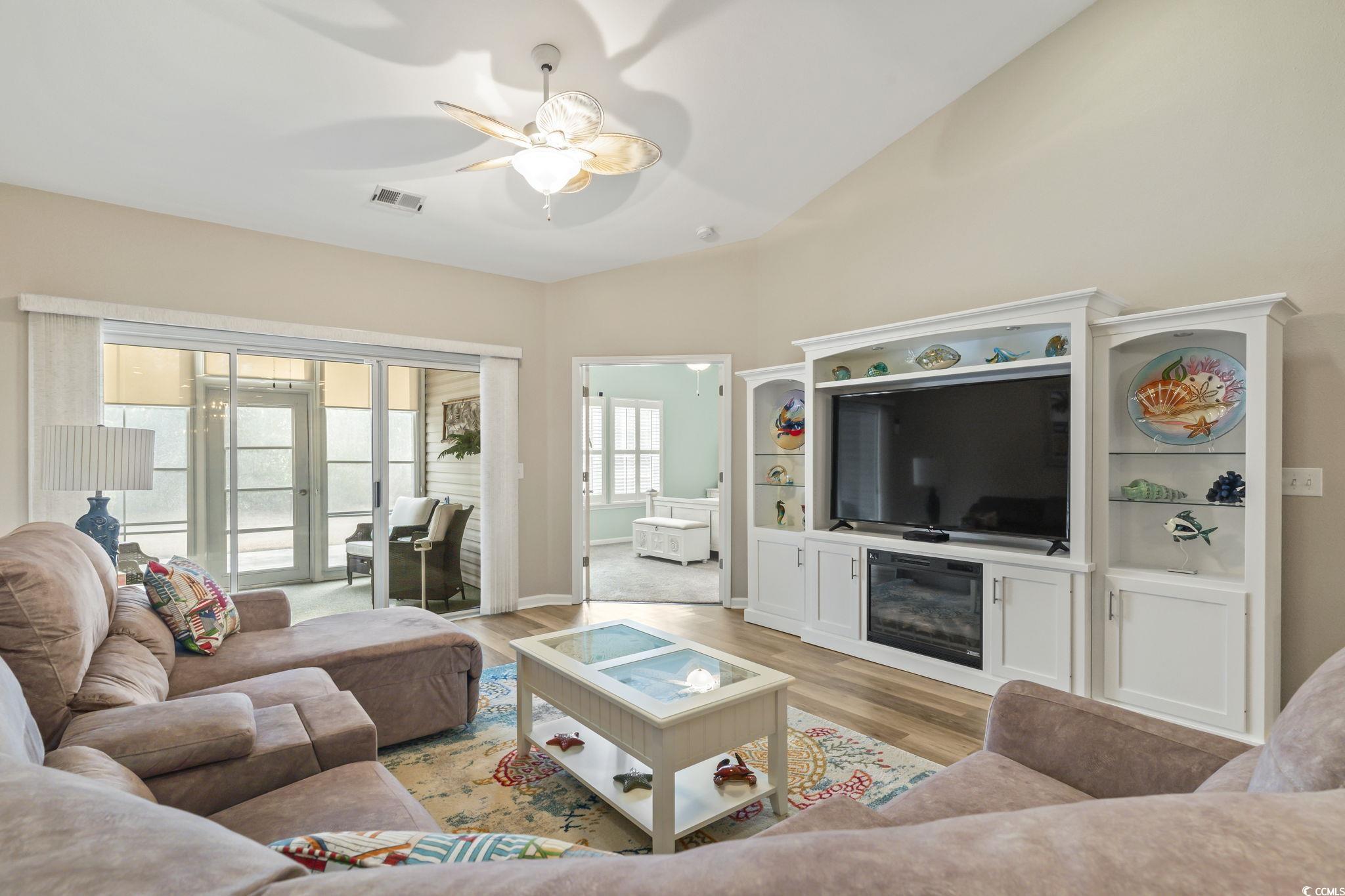 430 Woodpecker Lane, Unit D Murrells Inlet, SC 29576 - Photo 15 of 36 Living room with light wood-style flooring and ceiling fan