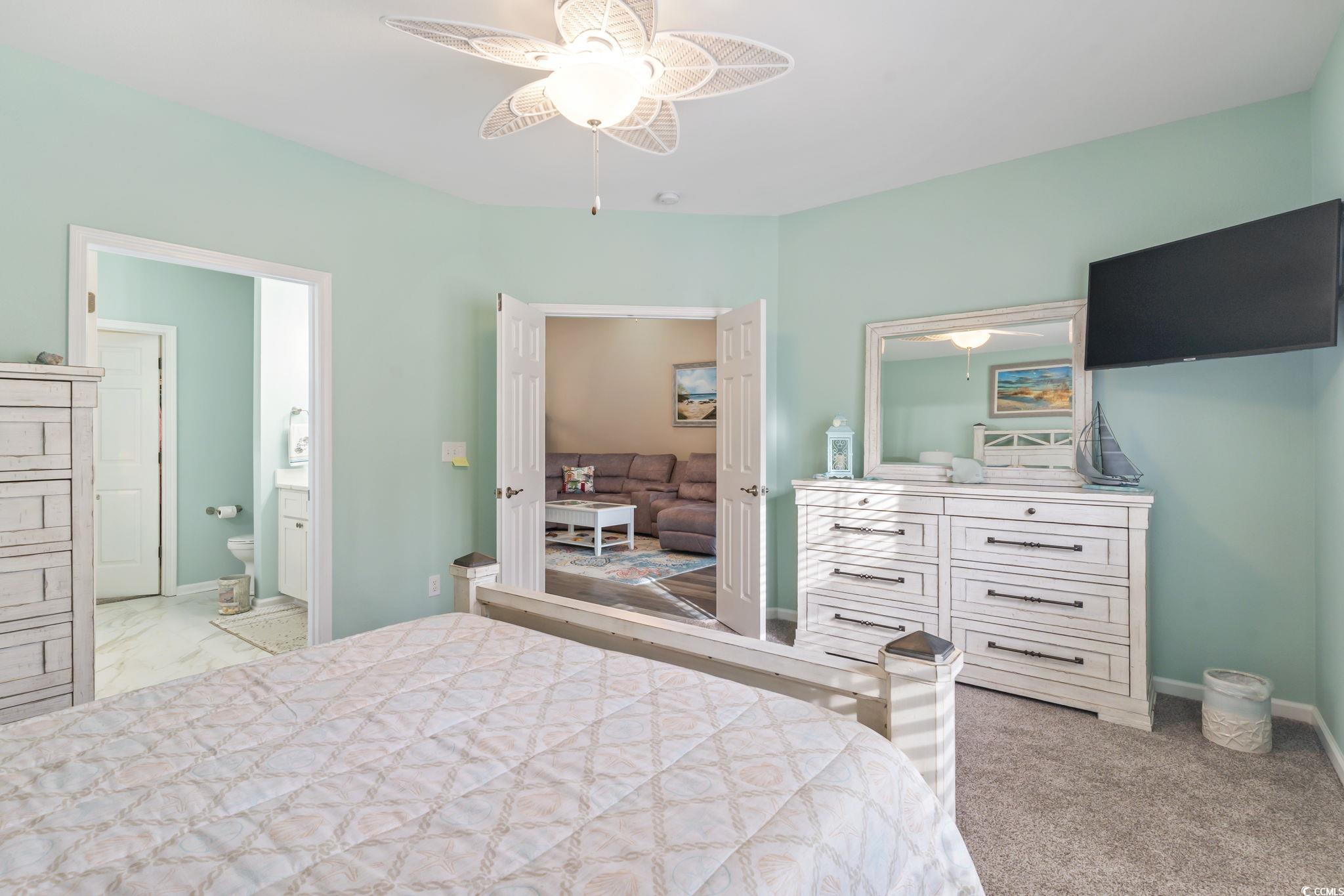 430 Woodpecker Lane, Unit D Murrells Inlet, SC 29576 - Photo 18 of 36 Bedroom featuring a ceiling fan and baseboards