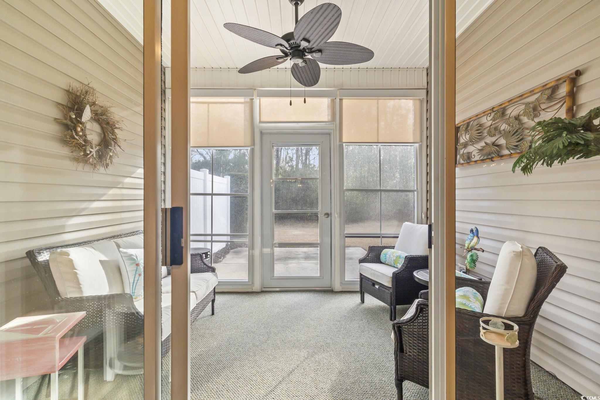 430 Woodpecker Lane, Unit D Murrells Inlet, SC 29576 - Photo 25 of 36 Sunroom with a ceiling fan and plenty of natural light