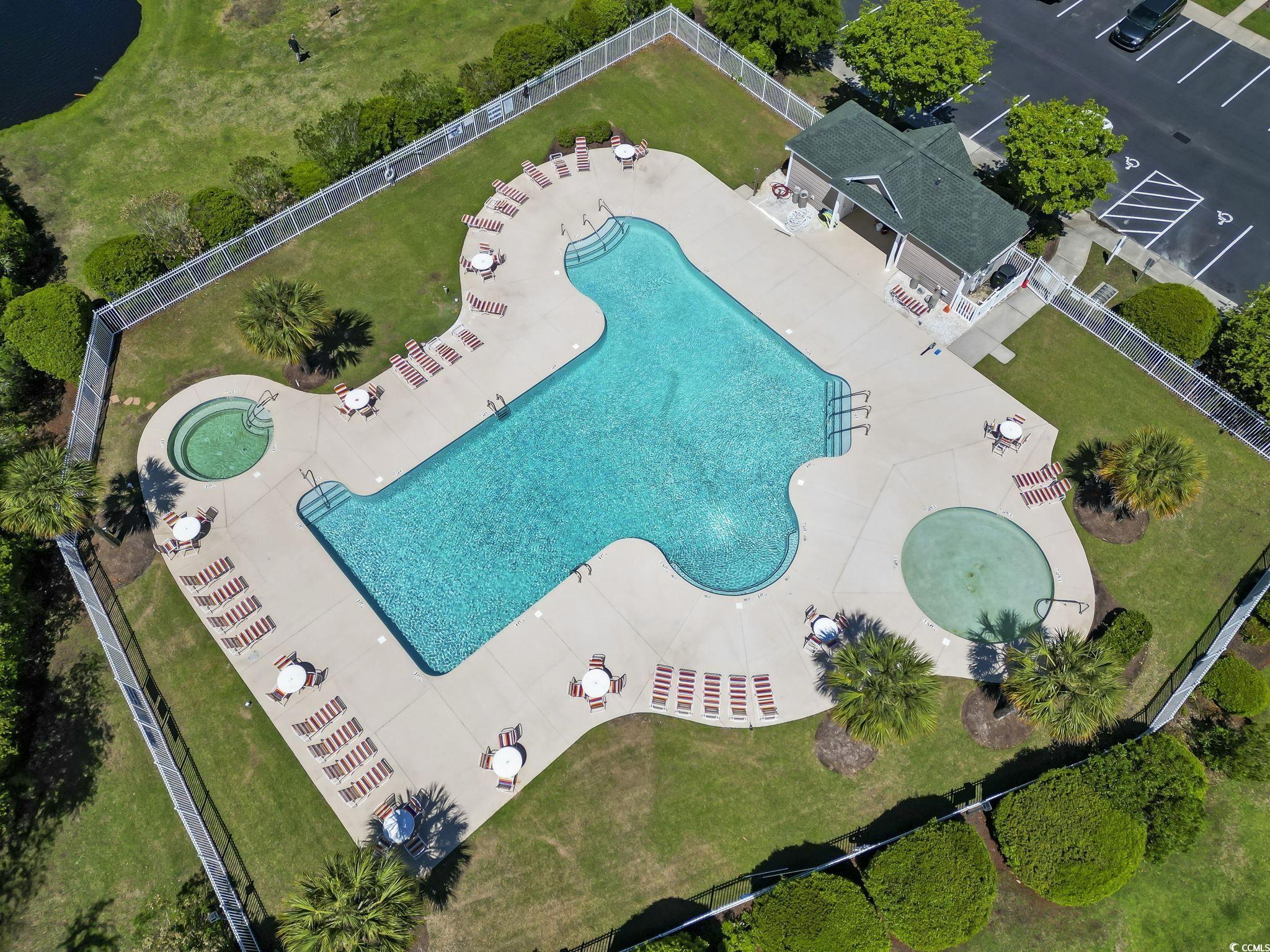 430 Woodpecker Lane, Unit D Murrells Inlet, SC 29576 - Photo 33 of 36 Bird's eye view of a pool