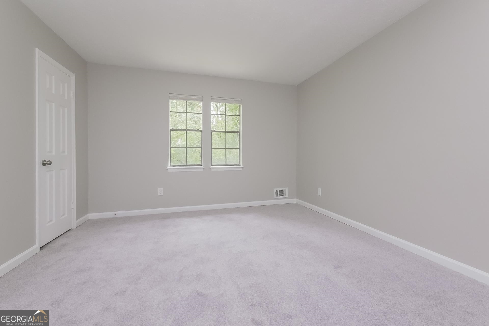 6645 Cameron Road Morrow, GA 30260 - Photo 12 of 17 an empty room with a window