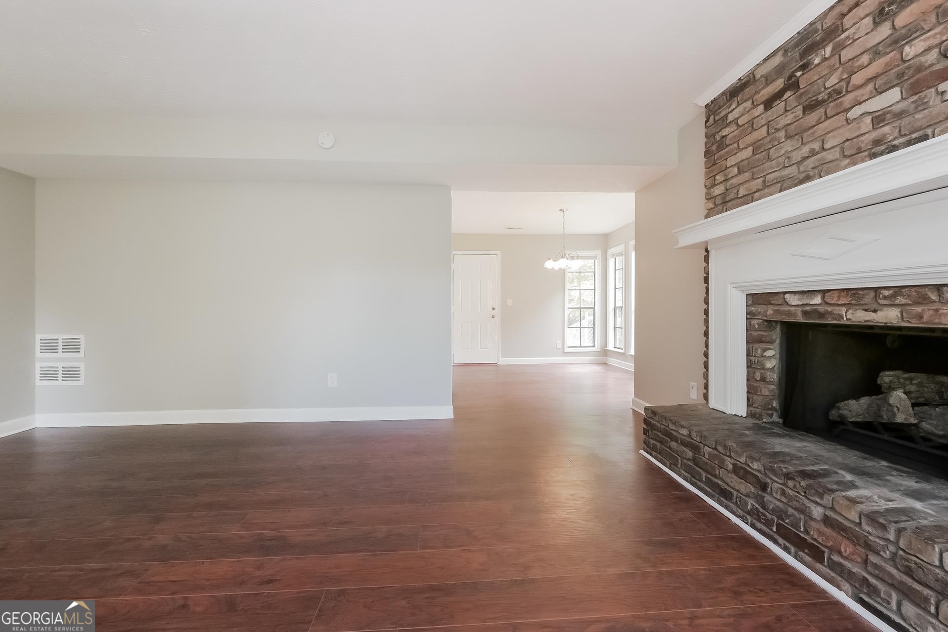 6645 Cameron Road Morrow, GA 30260 - Photo 6 of 17 a living room with furniture and a fireplace