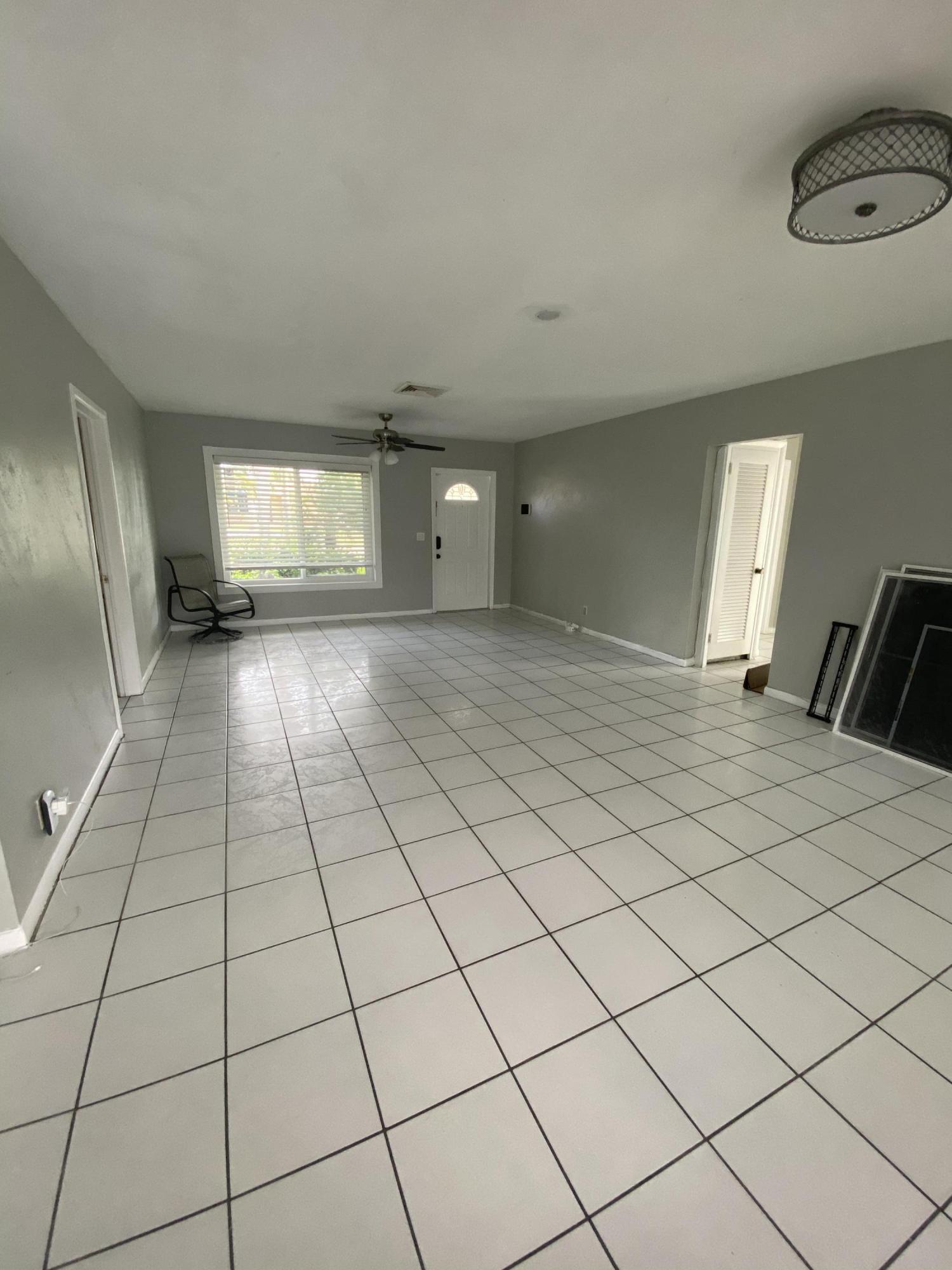 1711 High Ridge Road Lake Worth, FL 33461 - Photo 3 of 14 a view of a room & utility room