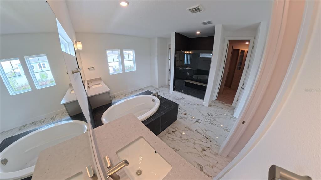 15295 Rising Vw Drive Montverde, FL 34756 - Photo 25 of 50 a living room with furniture and a wooden floor