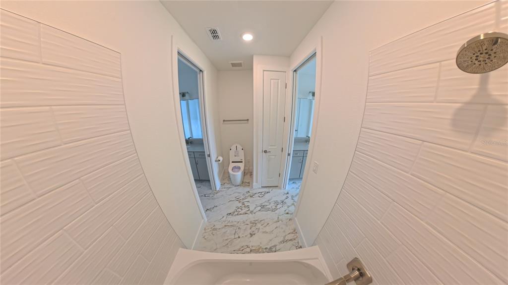 15295 Rising Vw Drive Montverde, FL 34756 - Photo 29 of 50 a bathroom with a sink and a shower