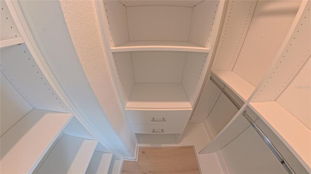 15295 Rising Vw Drive Montverde, FL 34756 - Photo 33 of 50 a view of staircase with white walls and railing