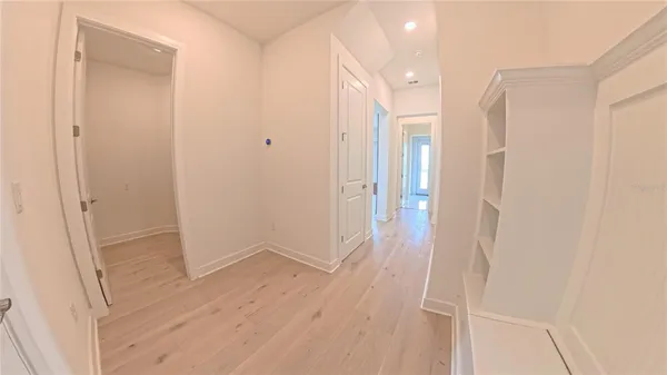 a view of a hallway of a house