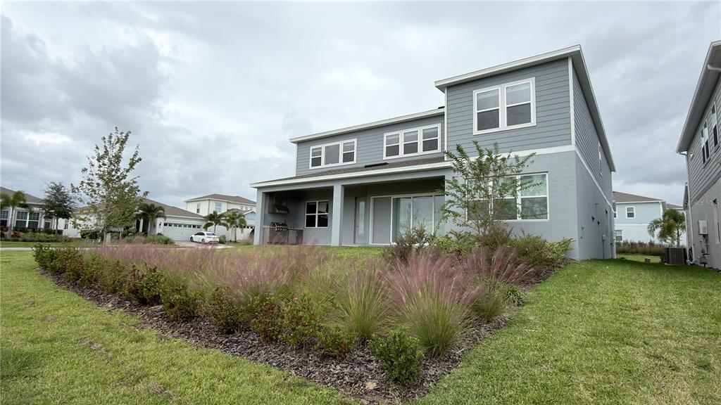 15295 Rising Vw Drive Montverde, FL 34756 - Photo 46 of 50 a view of a house with a yard