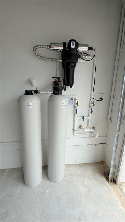 15295 Rising Vw Drive Montverde, FL 34756 - Photo 48 of 50 a room with a washer and dryer