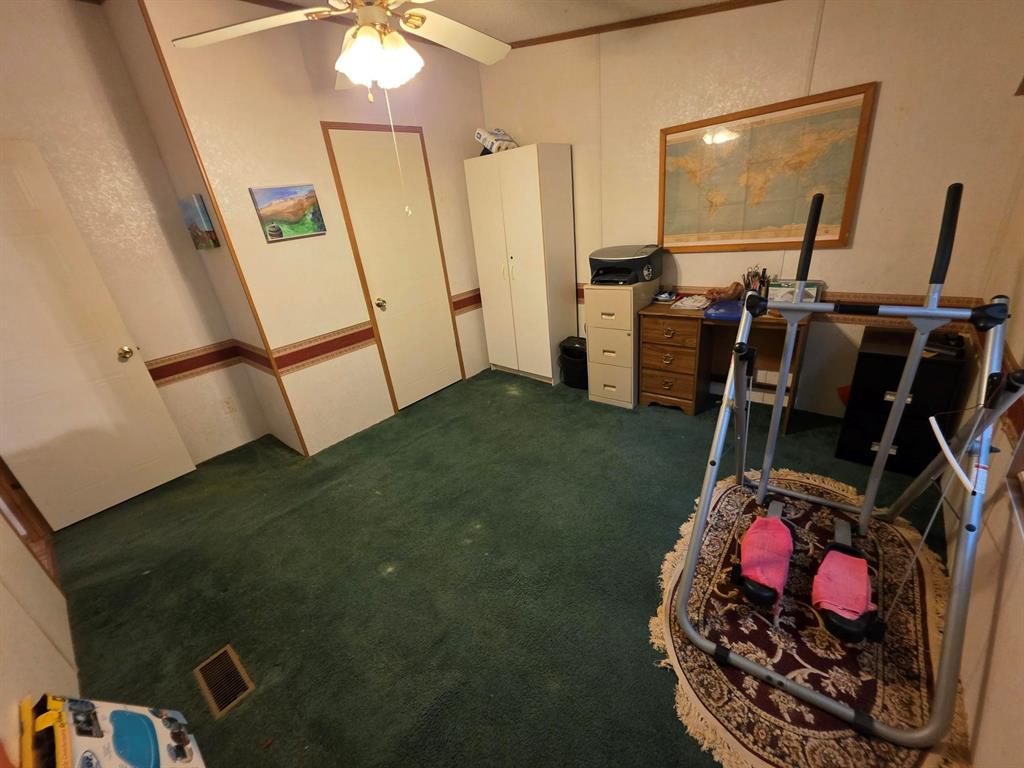 3872 East State Highway 154 Quitman, TX 75783 - Photo 39 of 40 a view of a room with gym equipment