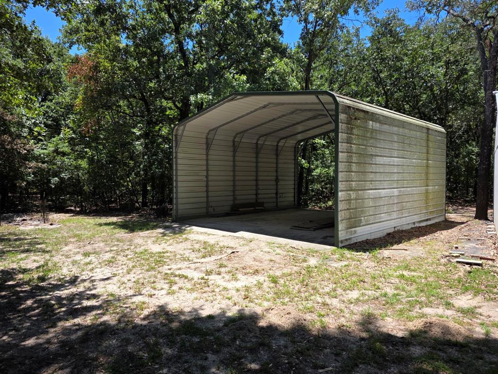 3872 East State Highway 154 Quitman, TX 75783 - Photo 4 of 40 a view of a house with a yard