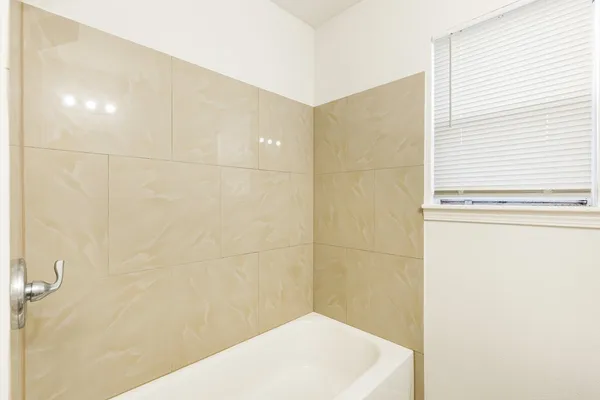 a bathroom with a bathtub