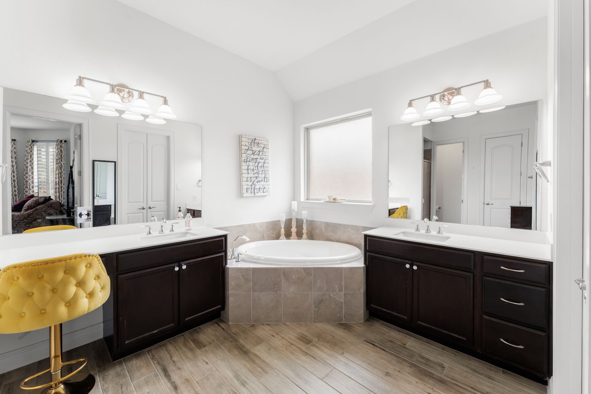 140 Waterloo Cove Georgetown, TX 78628 - Photo 21 of 40 Double vanities and a soaking tub create a luxurious and functional bathroom retreat.