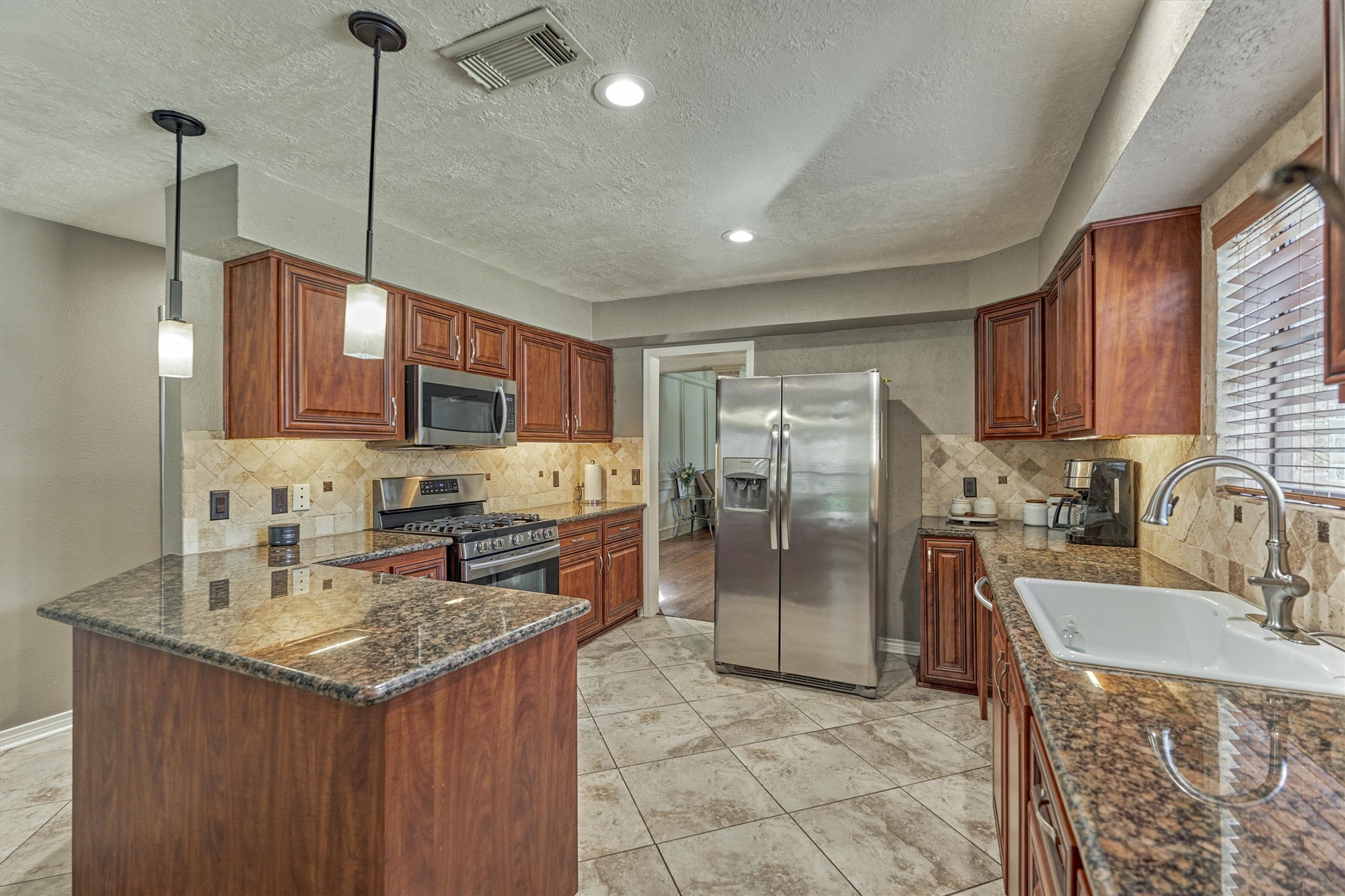 25706 Overlake Drive Spring, TX 77380 - Photo 11 of 32 Granite counter tops and updated kitchen