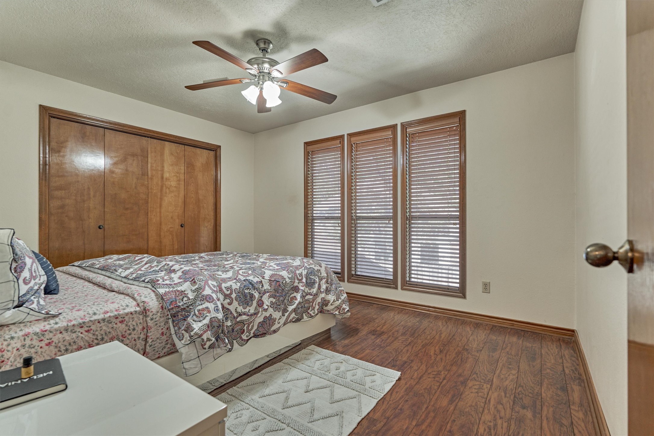 25706 Overlake Drive Spring, TX 77380 - Photo 19 of 32 Inviting second bedroom on the upper floor with wood floors.